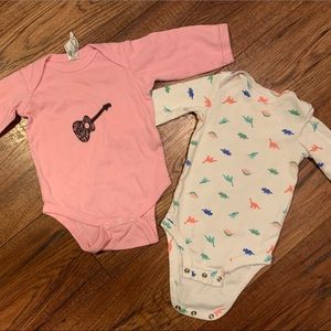 Dinosaur and guitar onesie